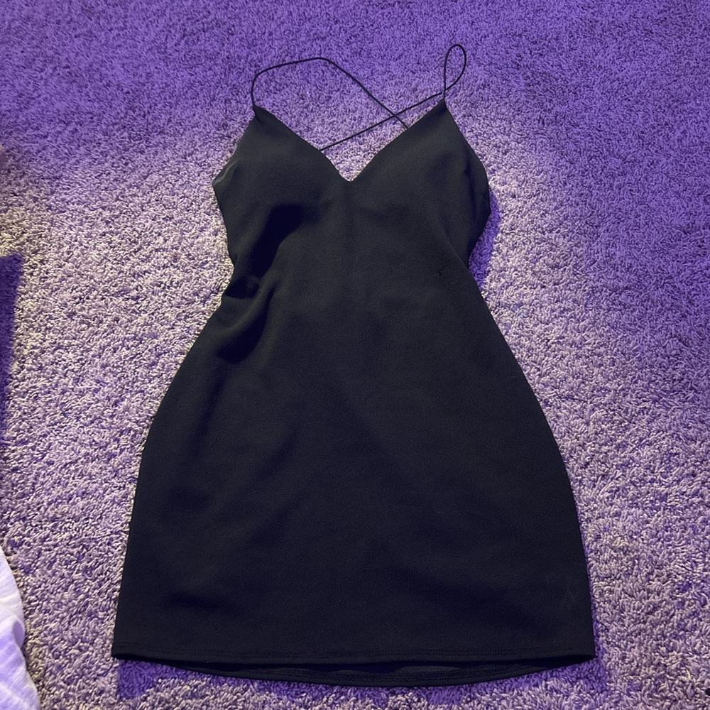 black mini dress, open back